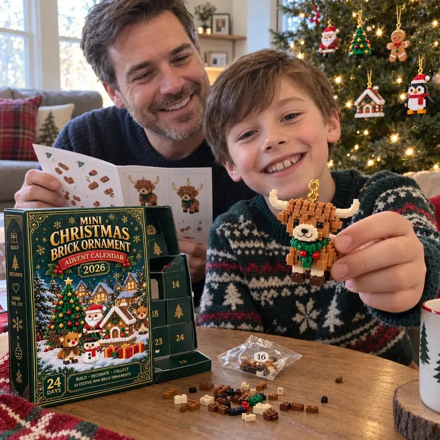 A dad and his son with a finished Highland Cow ornament